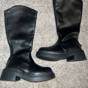 Sleek Black Heeled Boots for Women